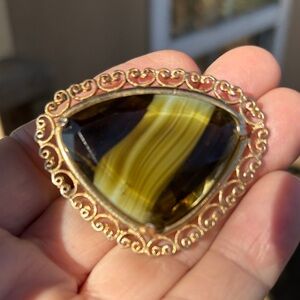 Brooch with brown & caramel glass